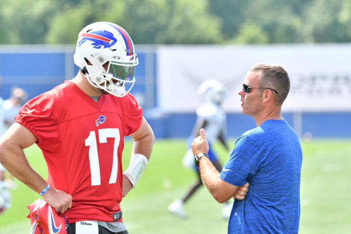 Jul 28, 2021; Orchard Park, NY, United States; Buffalo Bills general manager Brandon Beane has a word with quarterback Josh Allen (17) after practice at the Buffalo Bills Training Facility. Mandatory Credit: Mark Konezny-USA TODAY Sports